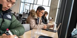 A student working on their laptop